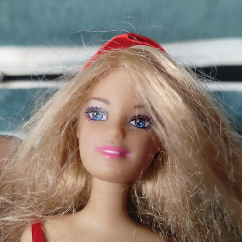 Doll dressed as Santa Claus used