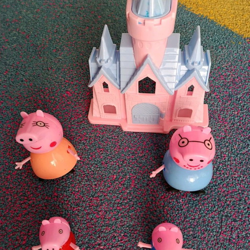 Peppa Pig family figure set with pink castle like new