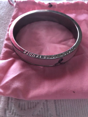 Estée Lauder bracelet like new, stainless steel, collectible