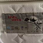 Double bed with Linea Strom mattress like new, fabric base 150x200 cm