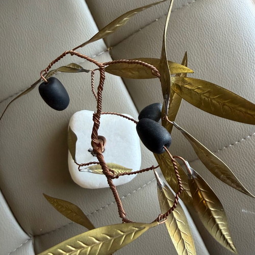 Handmade olive decoration on marble base used