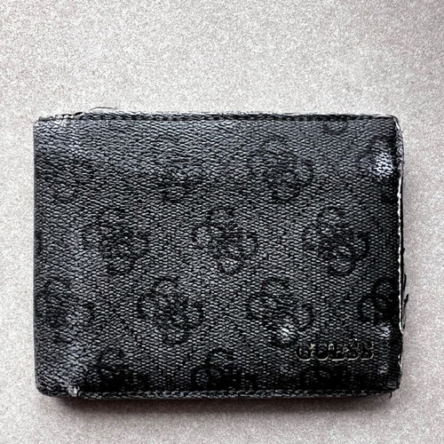 Guess wallet used with visible wear, black