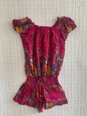 Turquoise floral romper used, sizes S/M