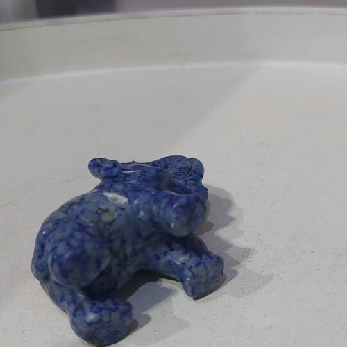 Decorative elephant carved from natural blue stone like new