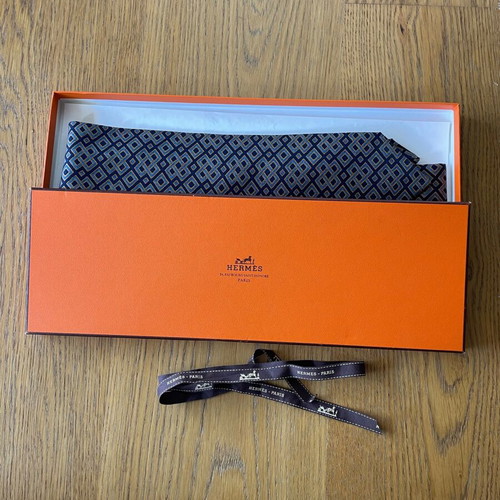 Hermes silk tie new with dark blue background