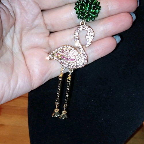 Flamingo stud earrings like new, impressive