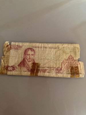 100 drachmas used with signs of wear