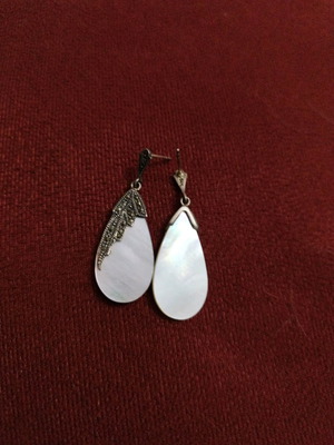 Silver dangling earrings used