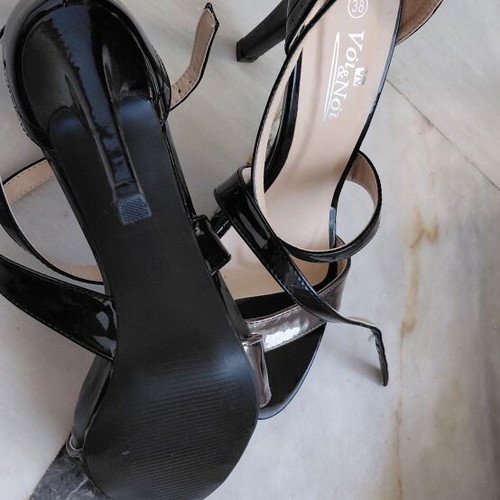 Black patent leather women's sandals with silver detail