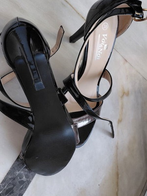 Black patent leather women's sandals with silver detail