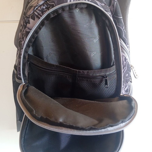Polo character school backpack with multiple compartments