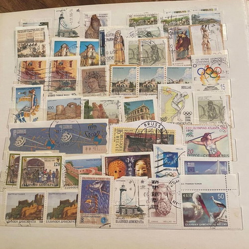 Stamp collection used with album, over 500 pieces