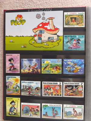 Disney collectible album with 220 stamps and 16 cards
