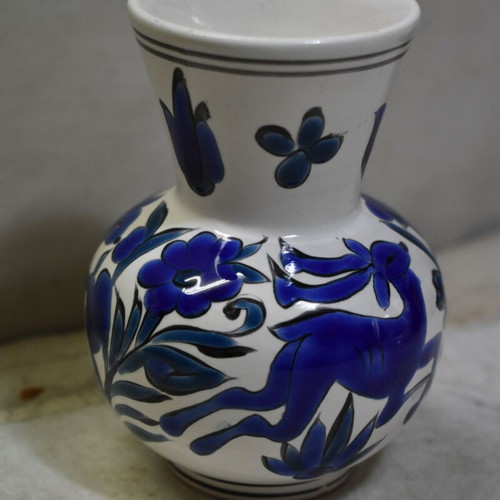 Handmade ceramic vase from Rhodes used with blue decoration