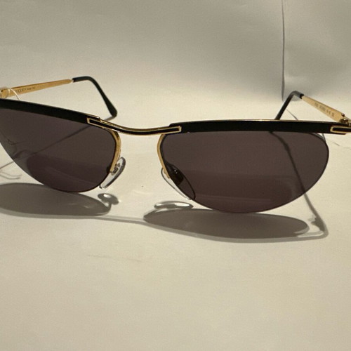 Vintage Vogue sunglasses with gold and black details, new