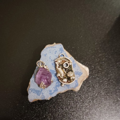 Silver pendant handmade with amethyst and liquid glass