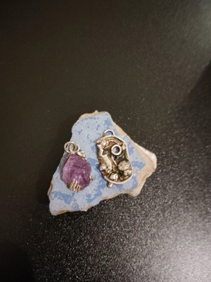 Silver pendant handmade with amethyst and liquid glass