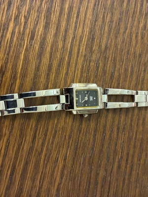 Q&Q Vintage Women's Wristwatch like new with silver bracelet and black dial