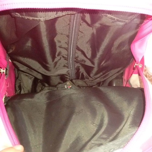 Polo Glow Girl school trolley bag used, fuchsia color