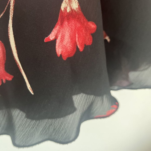 Black floral skirt with transparency medium, used