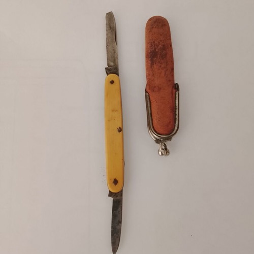 Vintage folding pocket knife with leather wallet case used