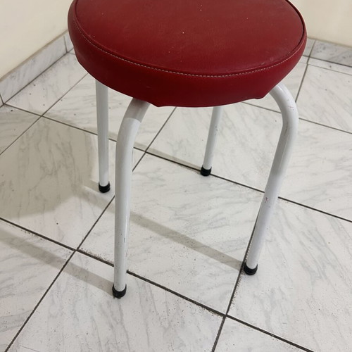 Stool with metal legs and red seat like new