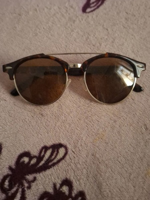 Women’s sunglasses new, tortoise style brown with silver details