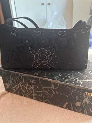 Handbag used black with floral decoration
