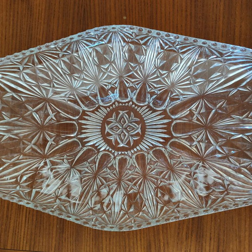 Oval crystal or glass platter like new with embossed patterns