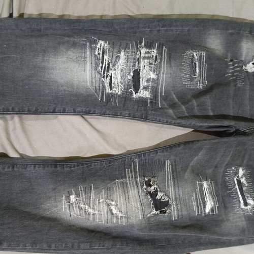 Black jeans with rips