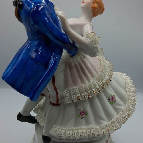 Vintage porcelain music figurine of dancing couple, like new