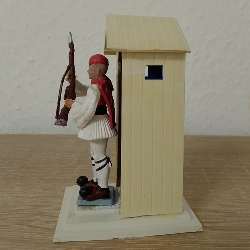 Athina Evzones figure in presenting stance used