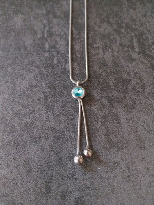 Steel necklace new with blue stone length 25cm