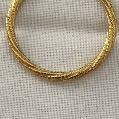 Iron golden rings with a twisted design.