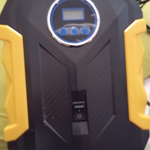 Portable digital car air pump like new with LCD and LED flashlight