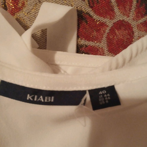 Short-sleeve dress used, size M, with back opening and bow
