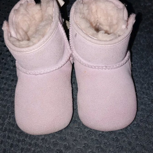 Ugg with fur inside like new