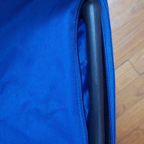 Travel sack used with handle and wheels, beige and blue