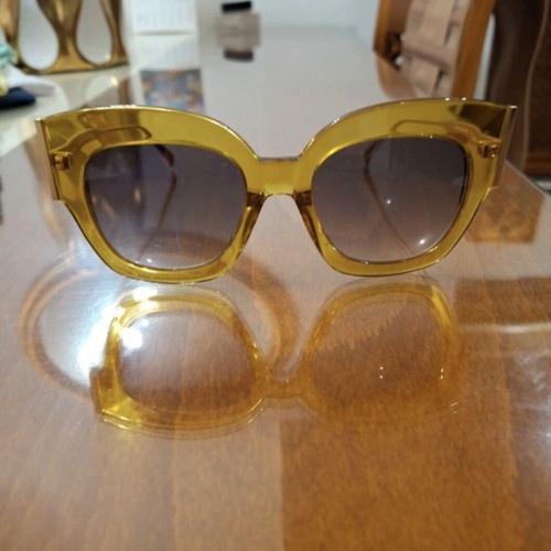 Tod's sunglasses new, gold color