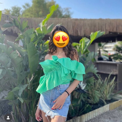 Green blouse with ruffles