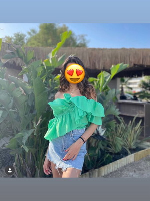 Green blouse with ruffles