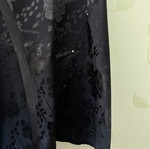A-Style black skirt with floral pattern and satin detail, new