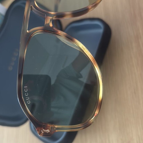Gucci women's sunglasses, gold color