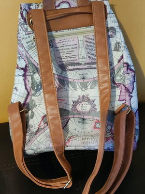 Backpack used multicolor with multiple storage compartments