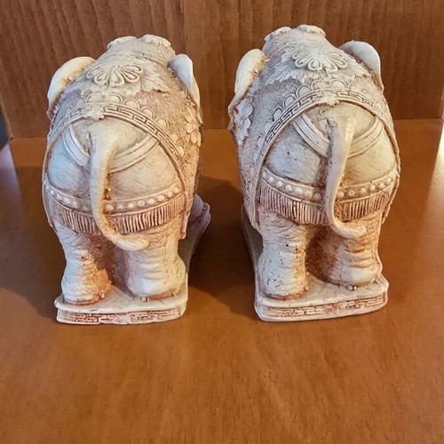 Pair of decorative elephants used with detailed embossed design