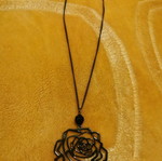 Necklace like new with rose design black and gray