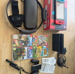 Nintendo Switch console bundle with 4 games and accessories