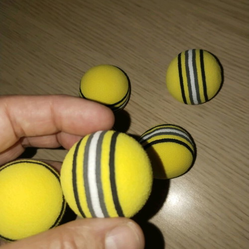 Set of yellow cat toy balls new