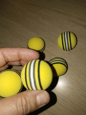 Set of yellow cat toy balls new