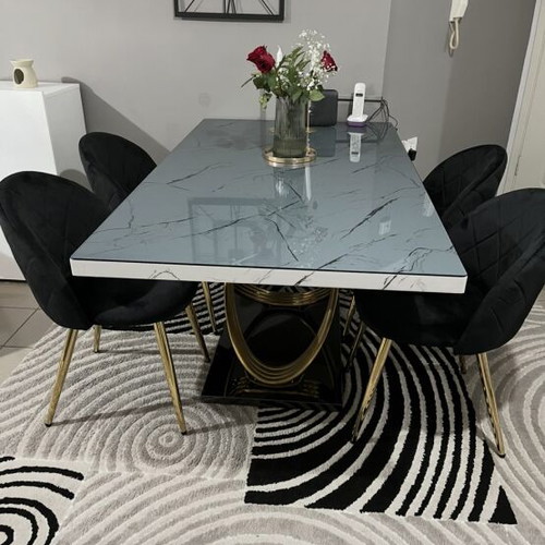 Dining table with smoked glass and 4 chairs like new